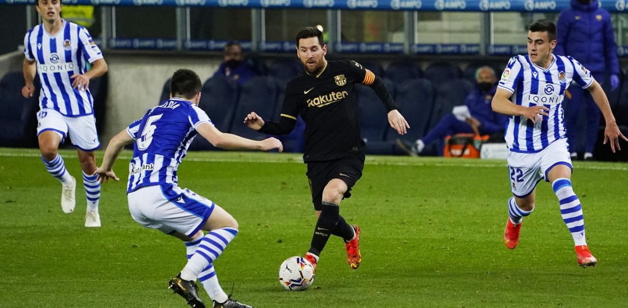 FC Barcelona's Lionel Messi in action with Real Sociedad. Credit: Reuters Photo