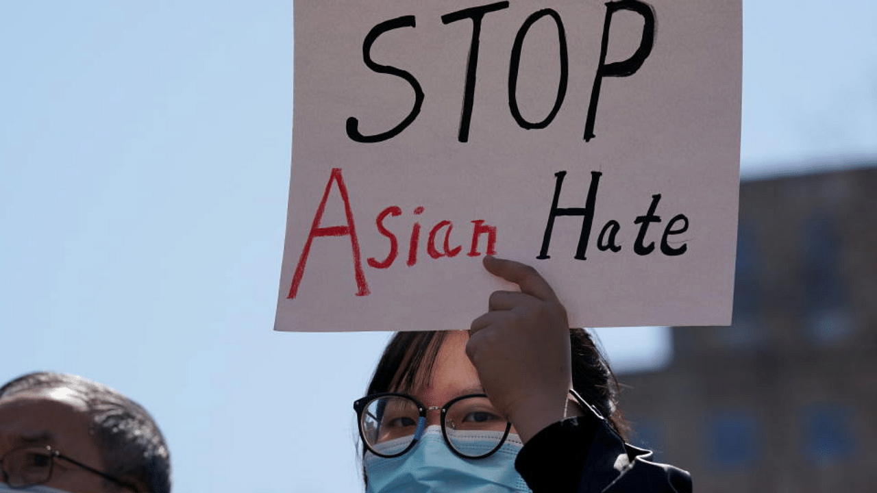 People rally to protest recent violence against people of Asian descent at McPherson Square near the White House in Washington, U.S. Credit: AFP Photo