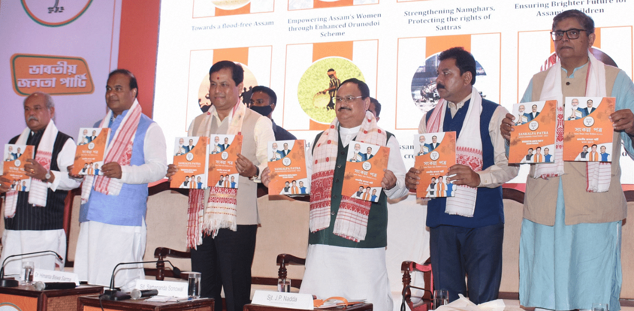 BJP President J P Nadda with Assam Chief Minister Sarbananda Sonowal, State BJP chief Ranjit Kumar Dass, NEDA convenor Himanta Biswa Sarmah and BJP Vice President Baijayant Panda releases the party's election manifesto for Assembly polls. Credit: PTI Photo