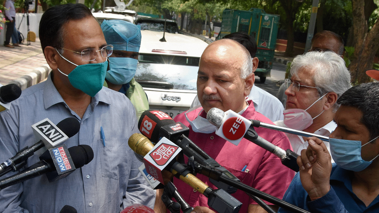 Delhi Health Minister Satyendra Jain (L) and Dy. Chief Minister Manish Sisodia. Credit: PTI Photo