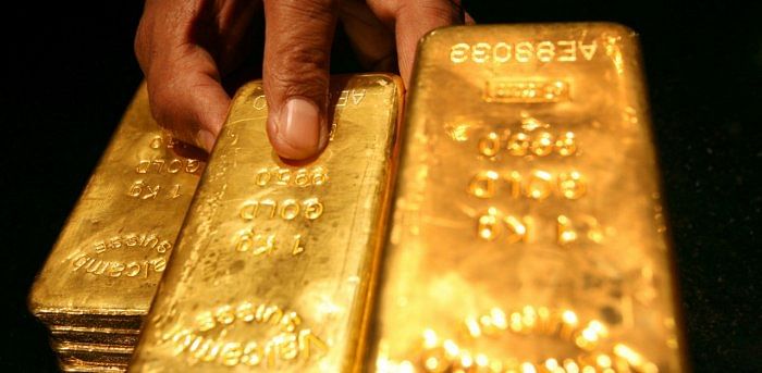 Spot gold was up 0.3 per cent at $1,731.75 per ounce. Credit: Reuters Photo