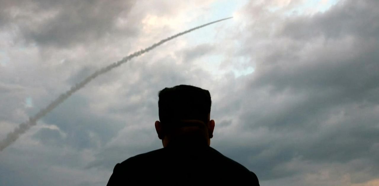 North Korean leader Kim Jong Un watching the launch of a ballistic missile. Credit: AFP Photo