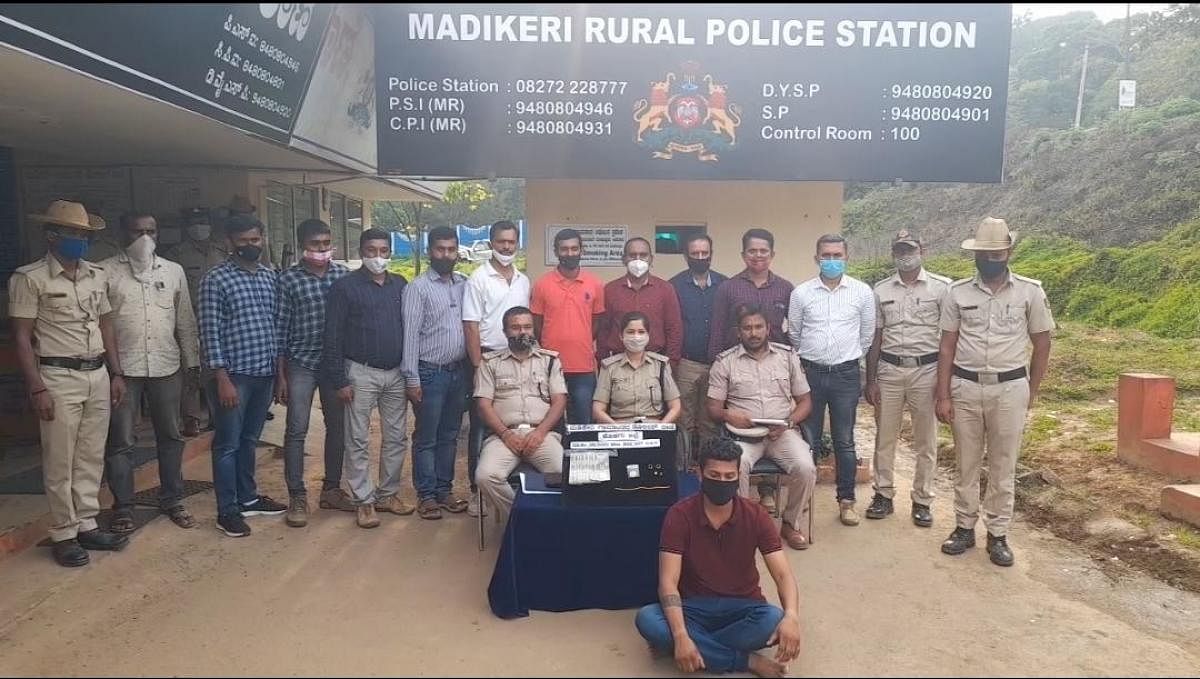 The police team with the accused and the seized valuables at Madikeri Rural Police Station.