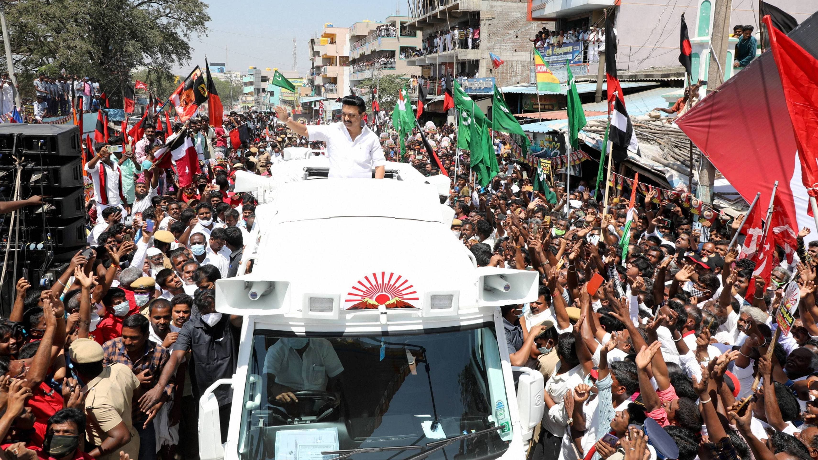 DMK leader MK Stalin waves at supporters during his election roadshow at Soolagiri ahead of Assembly polls. Credit: PTI File Photo