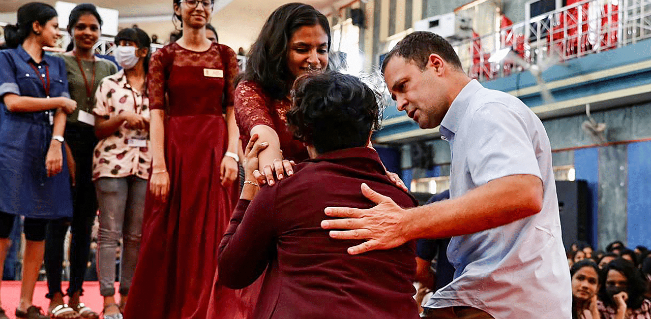 Congress leader Rahul Gandhi with students during his visit to St Theresa College in Kochi. Credit: PTI Photo