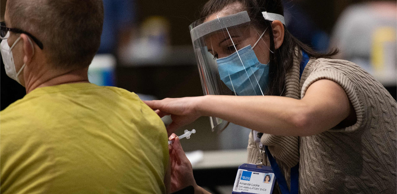 A person in the US is given a dose of a Covid-19 vaccine. Credit: AFP Photo