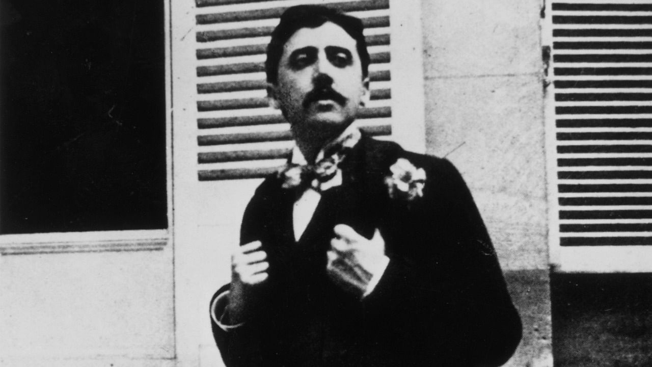  French author Marcel Proust (1871 - 1922) sitting outside a window. Credit: Getty Images