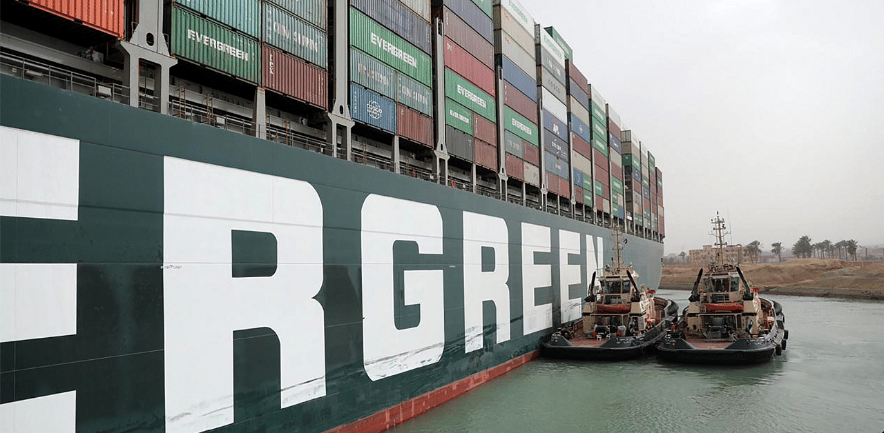 Egyptian tug boats trying to free Taiwan-owned MV Ever Given. Credit: AFP Photo