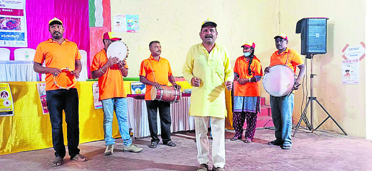 Raju and his troupe, from Zilla Vidya Sagara Kala Vedike, perform a skit on World TB Day, at Cauvery Kalakshetra in Madikeri.