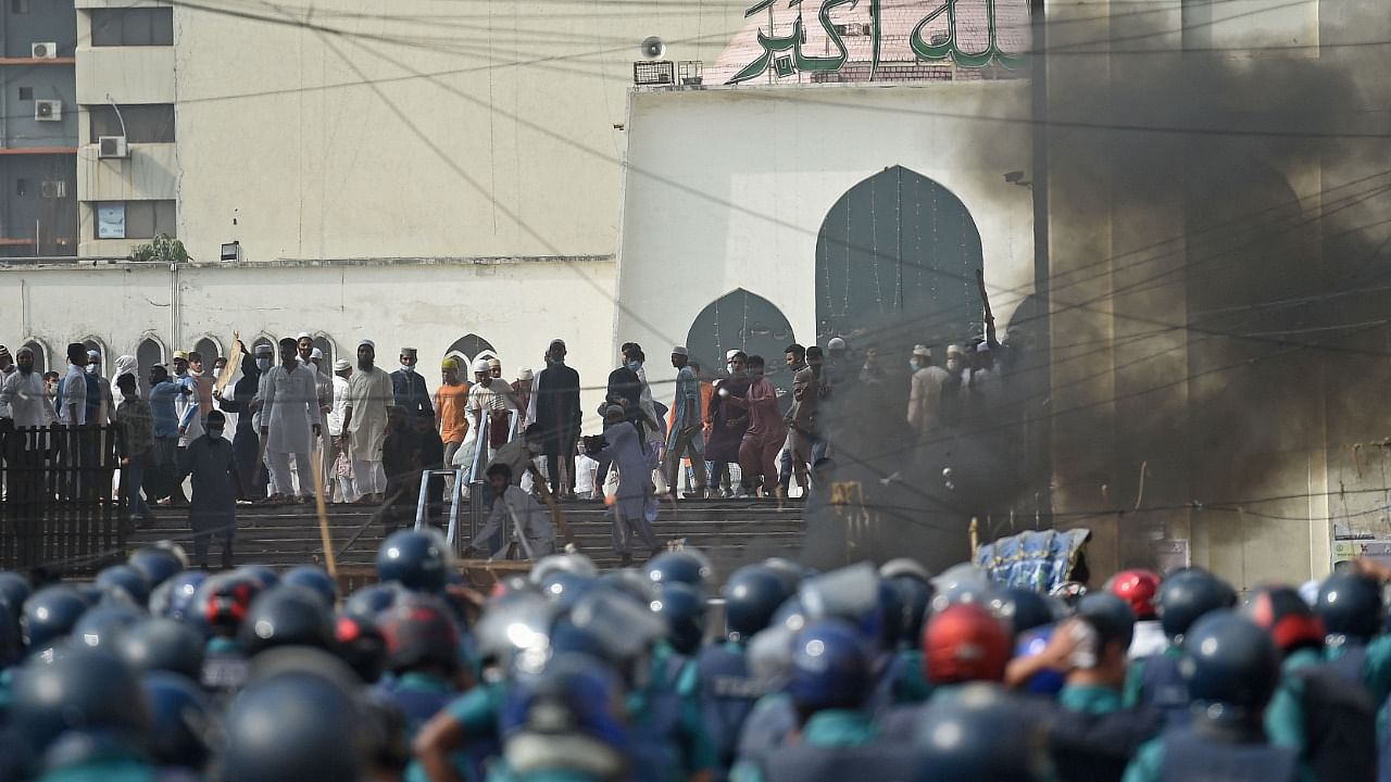 Activists from Islamist groups clash with the police as they protest against the visit of Indian Prime Minister Narendra Modi in Dhaka. Credit: AFP Photo