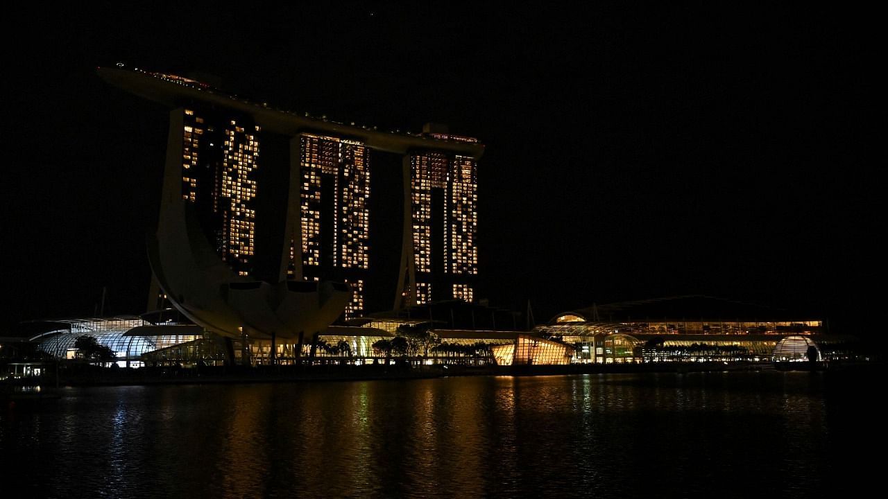 A general view of the Marina Bay Sands hotels and resorts is seen with the lights switched off for the Earth Hour environmental campaign in Singapore. Credit: AFP Photo