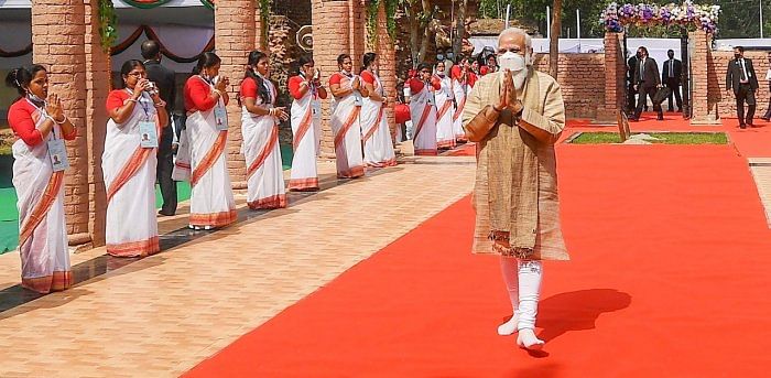 Modi commenced his two-day visit to the neighbouring country on Friday and visited the shrine of the Matuas at Orakandi on Saturday. Credit: PTI Photo