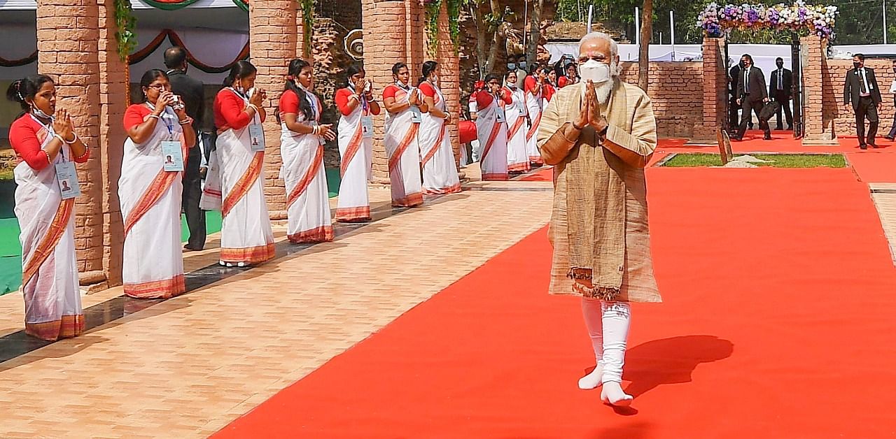 He was welcomed with 'Dhaak, Shankh, Ulu' in line with local rituals. Credit: PTI Photo