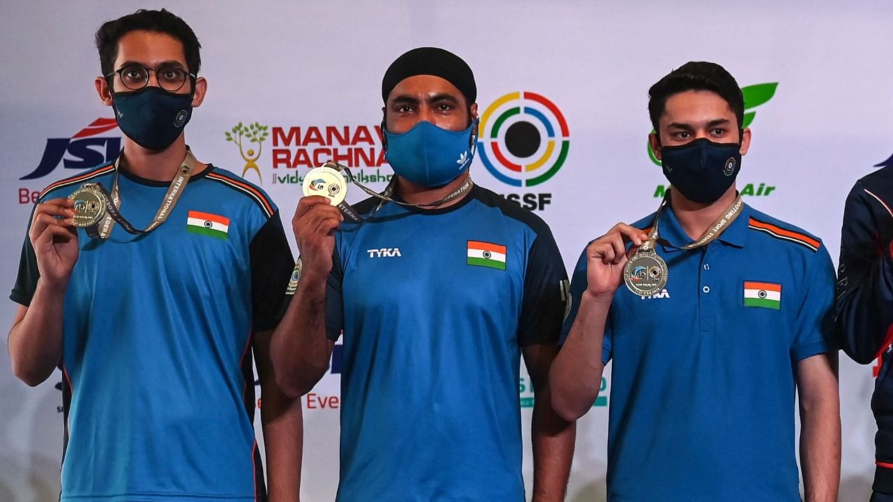 (L-R) Adarsh Singh, Gurpreet Singh and Vijayveer Sidhu of India. Credit: AFP Photo