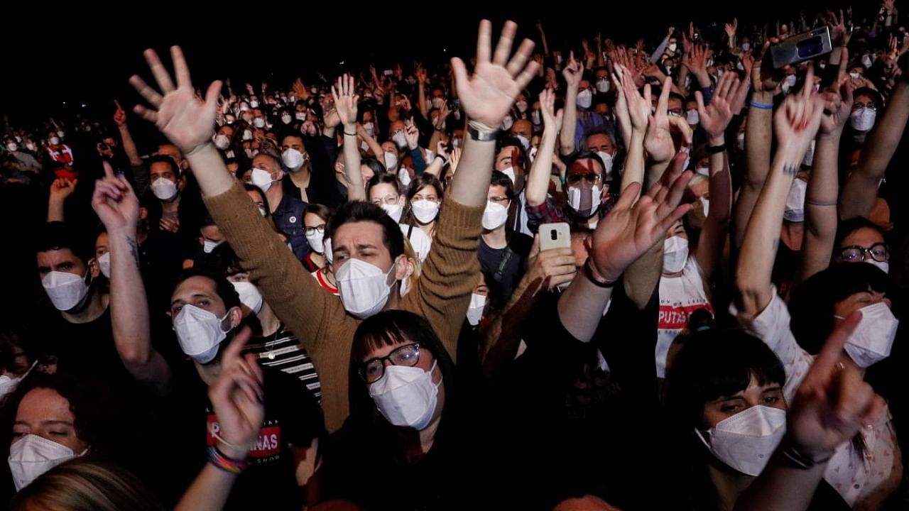 People attend first massive concert since the beginning of Covid-19 pandemic in Barcelona. Credit: Reuters.