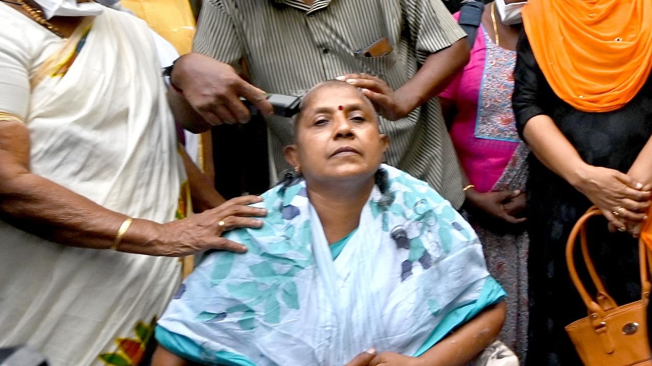 Lathika Subhash recently shocked everyone by tonsuring her head protesting against being denied assembly ticket. Credit: DH Pool Photo