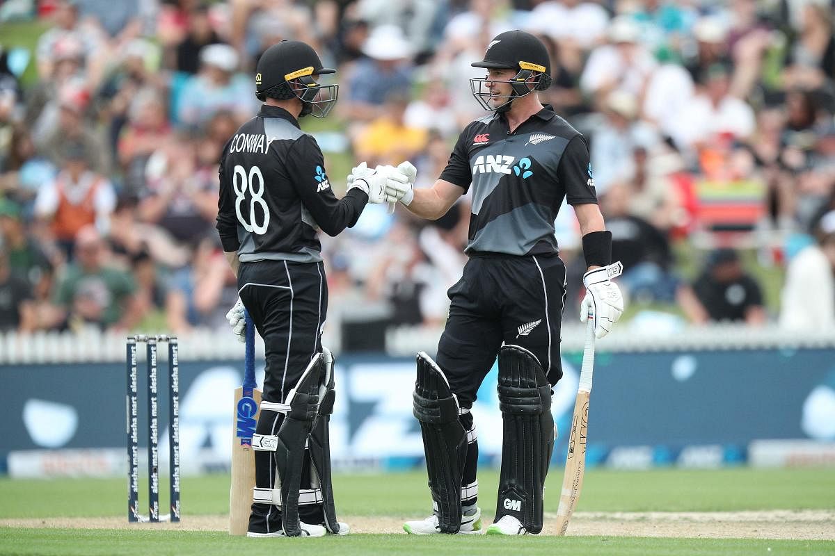 New Zealand's Devon Conway (L) and Will Young make a 100 run partnership during the first Twenty20 international cricket match between New Zealand and Bangladesh at Seddon Park in Hamilton. Credit: AFP photo. 