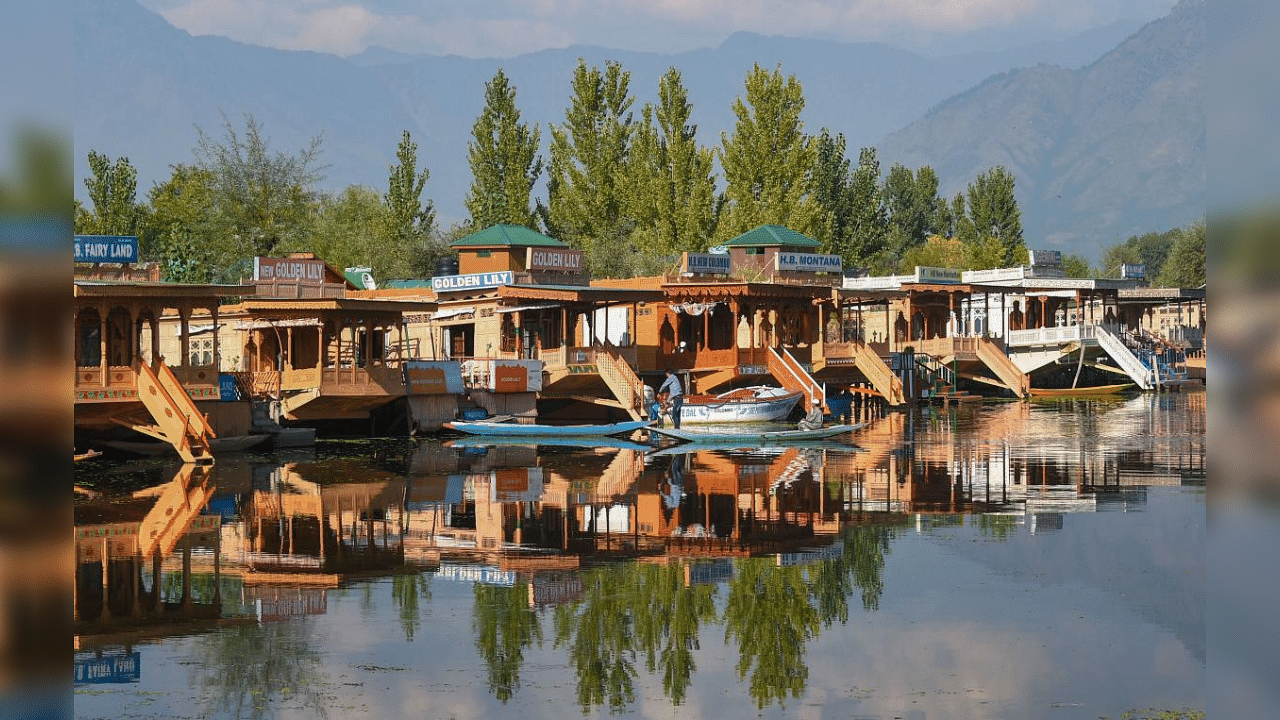 Empty shikaras and houseboats inside the famous Dal Lake in Srinagar. Credit: PTI File Photo
