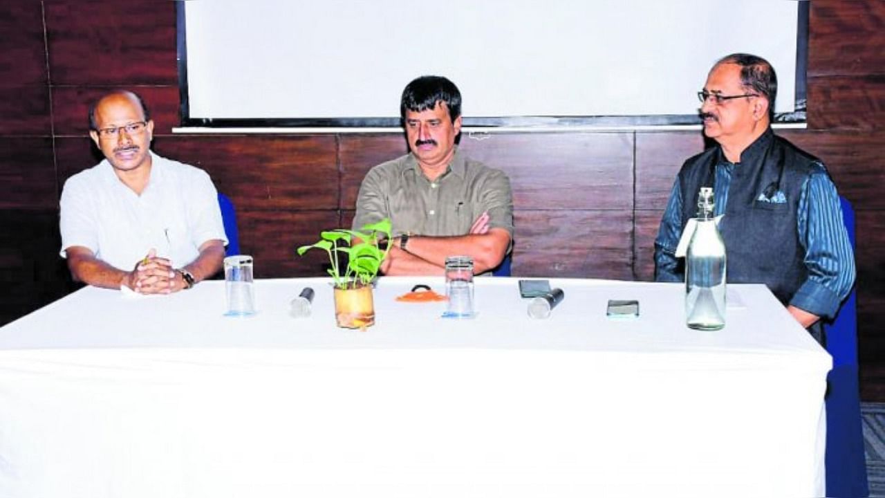 Tourism Minister C P Yogeeshwar takes part in a discussion during a meeting held at Club Mahindra in Madikeri. Credit: DH Photo