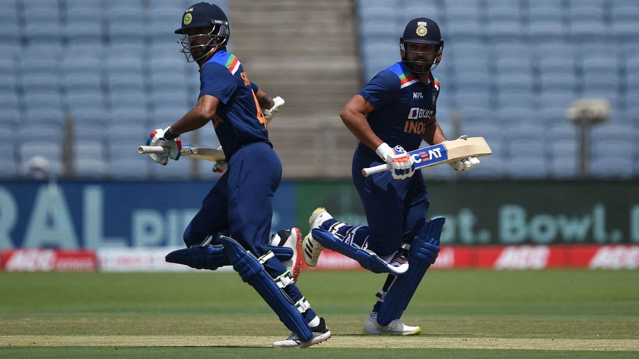 Shikhar Dhawan and Rohit Sharma in action on the field. Credit: AFP File Photo