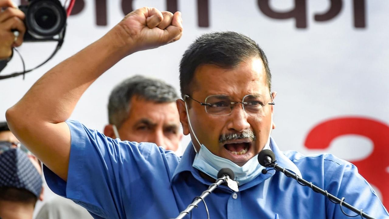 Delhi Chief Minister Arvind Kejriwal addresses a protest against the Centre's bill that gives overarching power to the Lieutenant Governor, at Jantar Mantar in New Delhi. Credit: PTI.