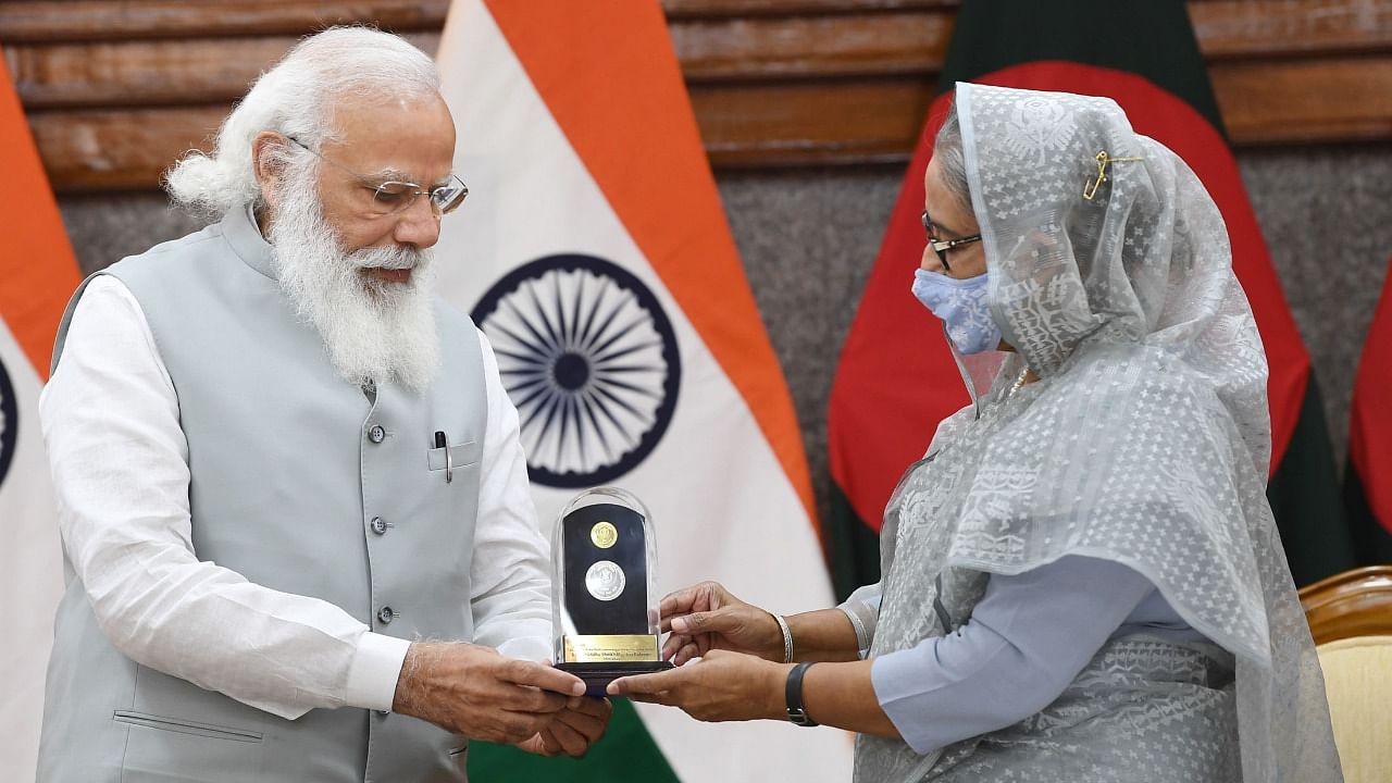 Prime Minister Narendra Modi with Sheikh Hasina during his visit to Bangladesh. Credit: PTI File Photo