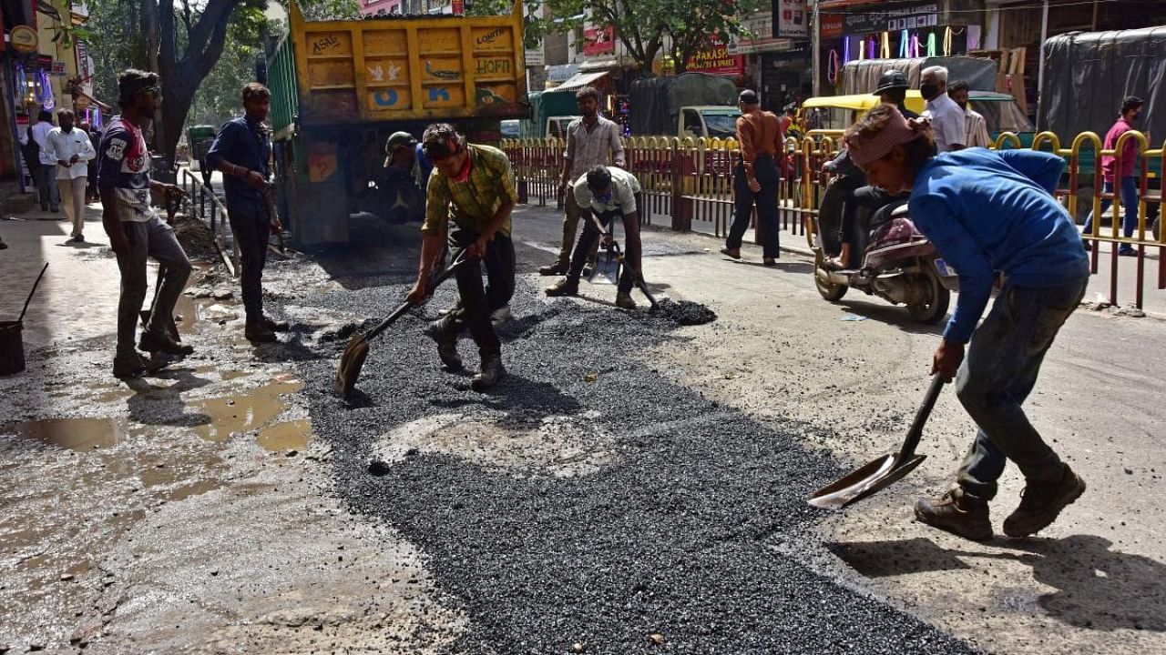 The Palike has been asked to provide specific locations of streets and footpaths where repair works have been undertaken. Credit: DH File Photo/Irshad Mahammad
