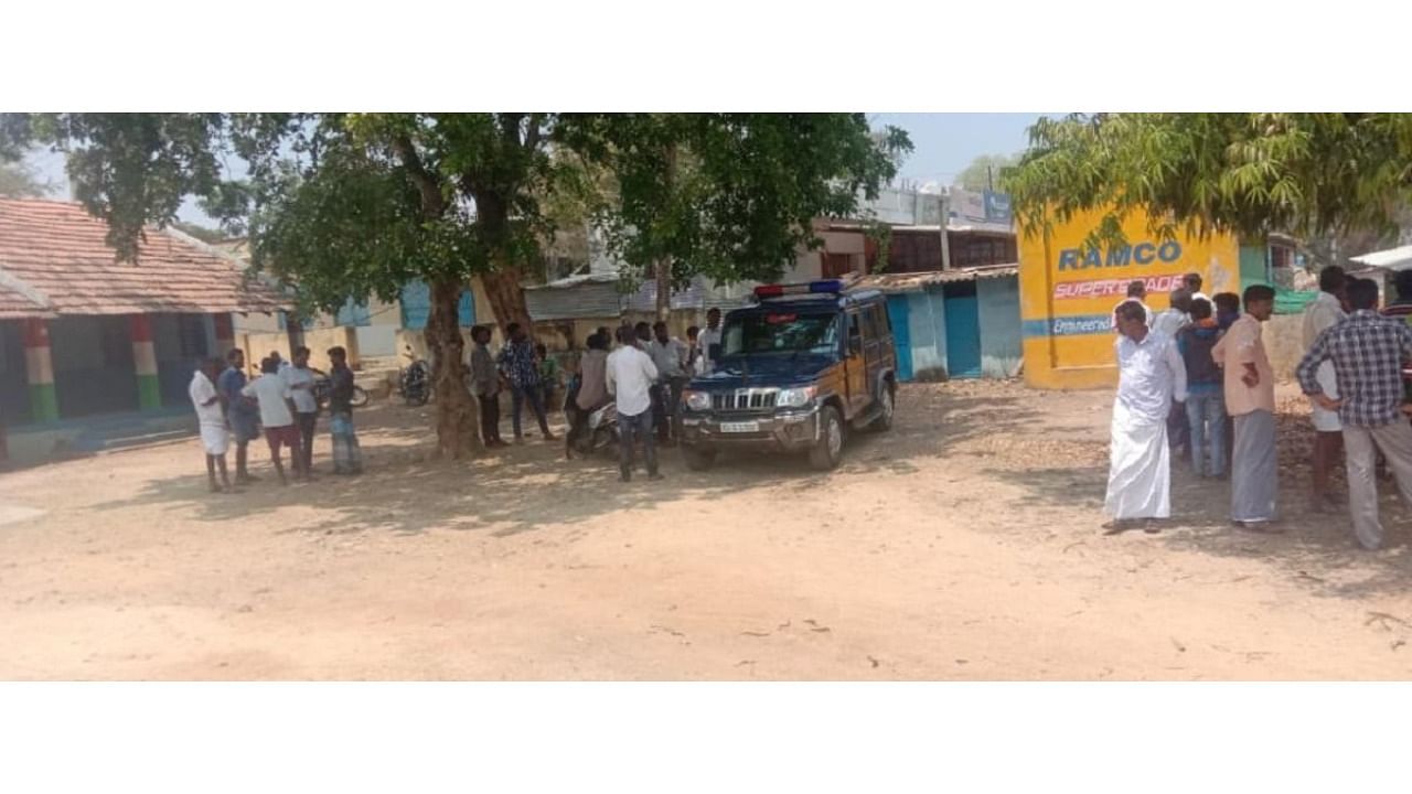 Police visit Kolipalaya Government School near Chamarajanagar where a student died after falling from a compound wall, on Wednesday. Credit: DH Photo