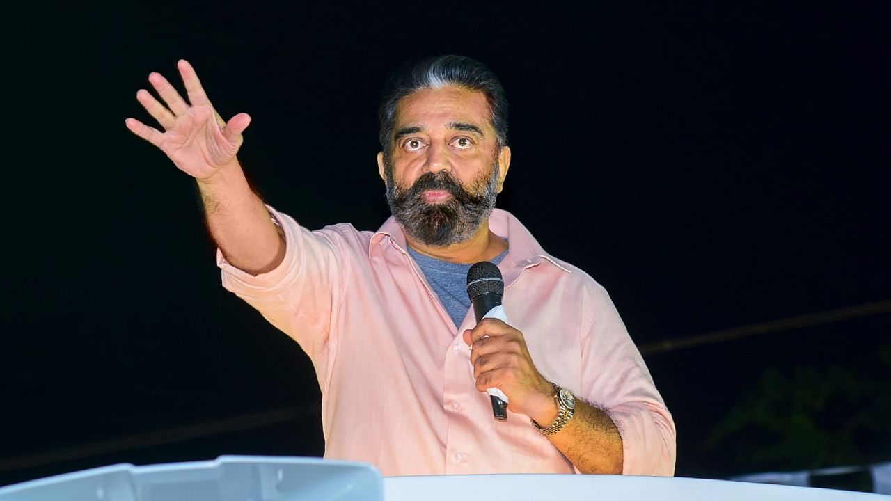 Makkal Needhi Maiam (MNM) President Kamal Haasan addresses during an election campaign rally for party candidate Muruganantham, ahead of the upcoming Tamil Nadu Assembly polls, in Tiruchi district, Monday, March 22, 2021. Credit: PTI Photo 
