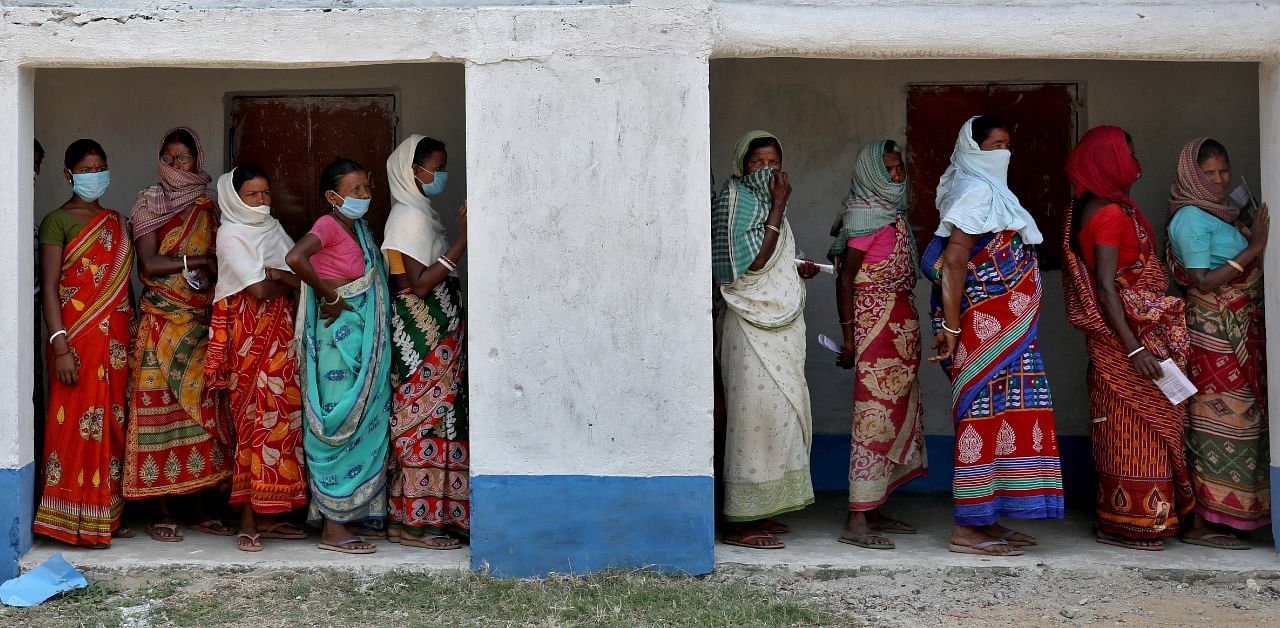 Long queues were seen outside polling stations. credit: Reuters Photo