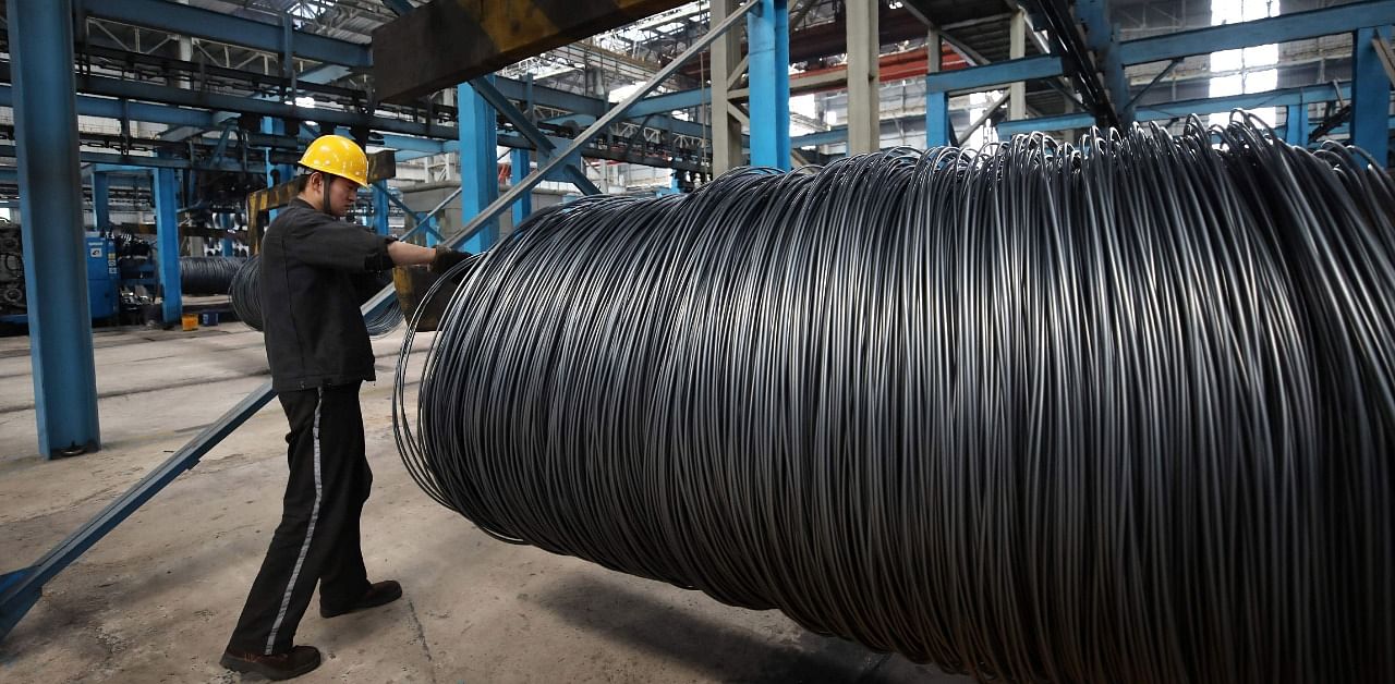  China's Caixin survey showed factories reporting a sharp increase in input costs. Credit: AFP Photo