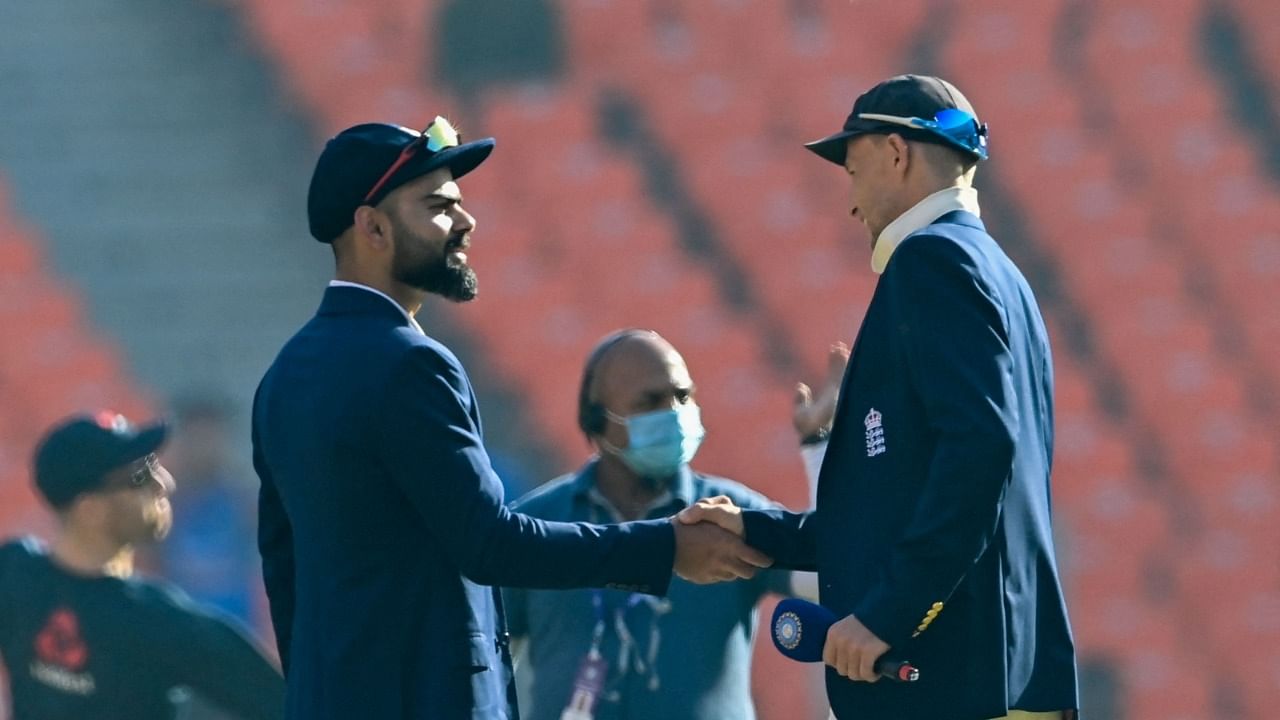 India's captain Virat Kohli (L) shakes hands with England's captain Joe Root. Credit: PTI photo