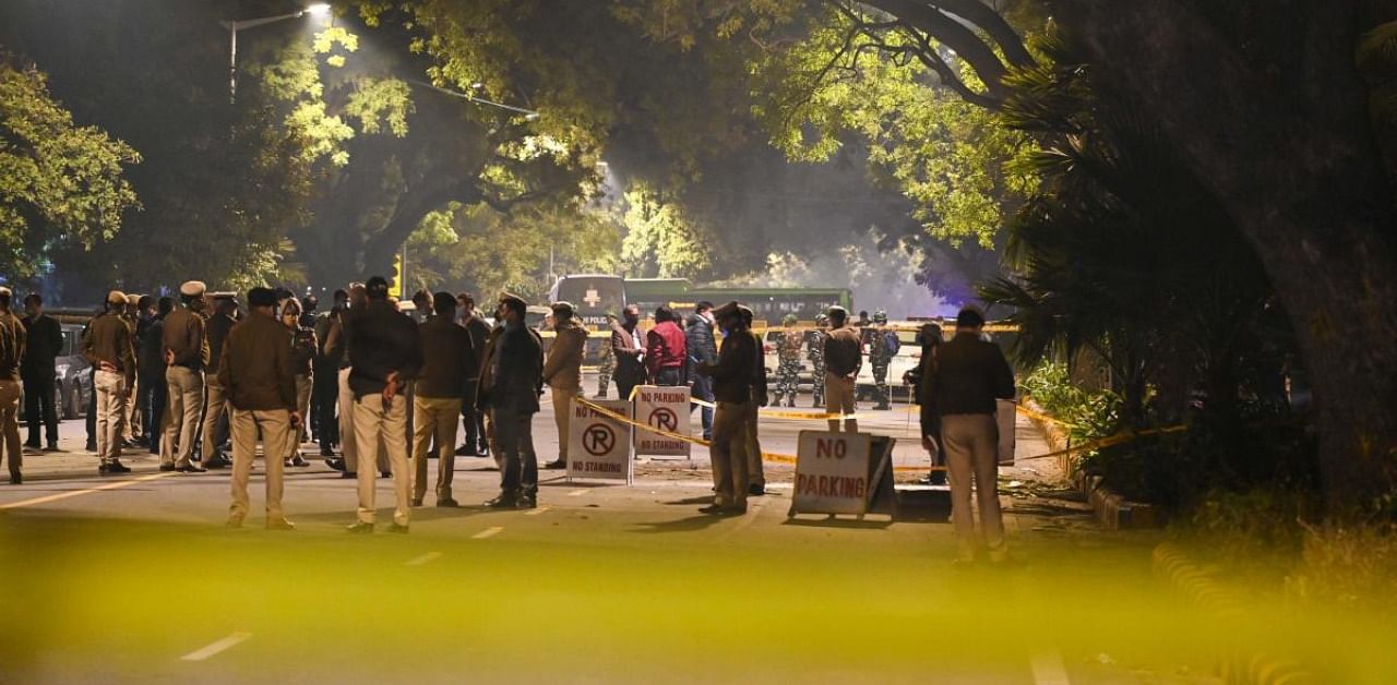 Police cordon off an area at a street after an explosion near the Israeli embassy in New Delhi on January 29, 2021. Credit: AFP Photo