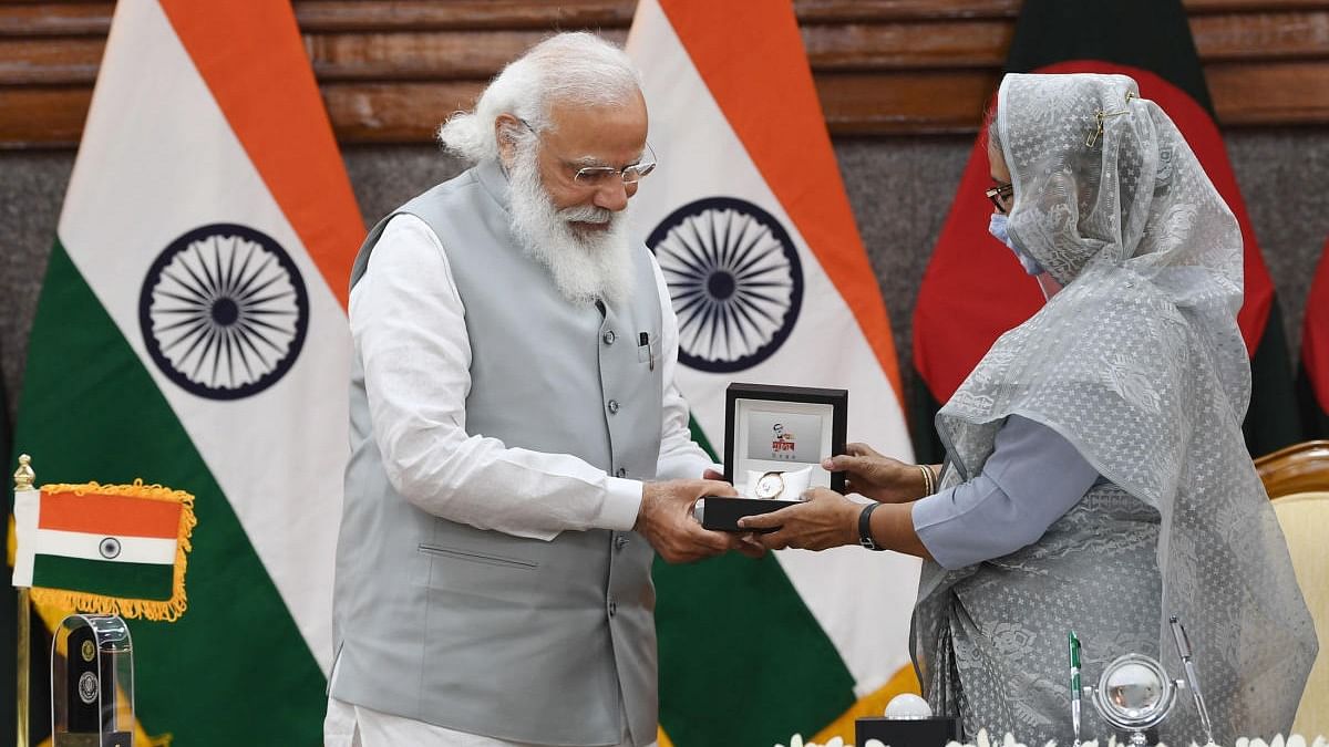 Prime Minister Narendra Modi and Prime Minister of Bangladesh Sheikh Hasina during the inauguration of the various projects in Bangladesh, in Dhaka, Saturday, March 27, 2021. Credit: PTI Photo