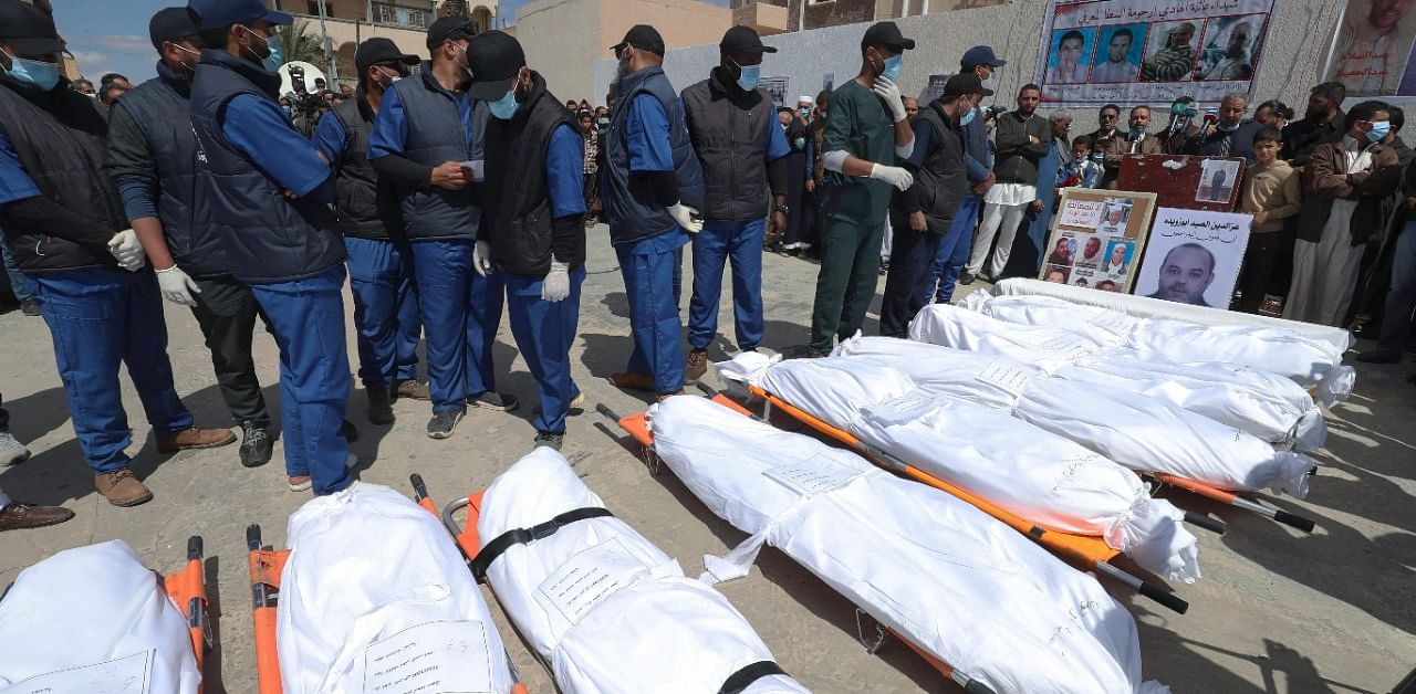 So far, 140 bodies have been exhumed in a slow process that began in June 2020. Credit: AFP Photo