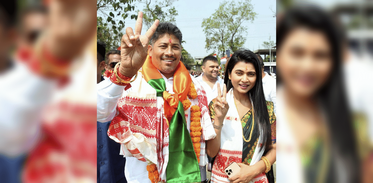 Assam Minister and BJP candidate from Jagiroad Assembly constituency Pijush Hazarika with his wife Aimee Baruah. Credit: PTI Photo