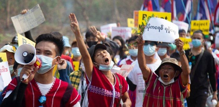 ethnic Karen people taking part in an anti-military coup demonstration in Hlaingbwe township, in eastern Myanmar's Karen state. Credit: AFP photo. 