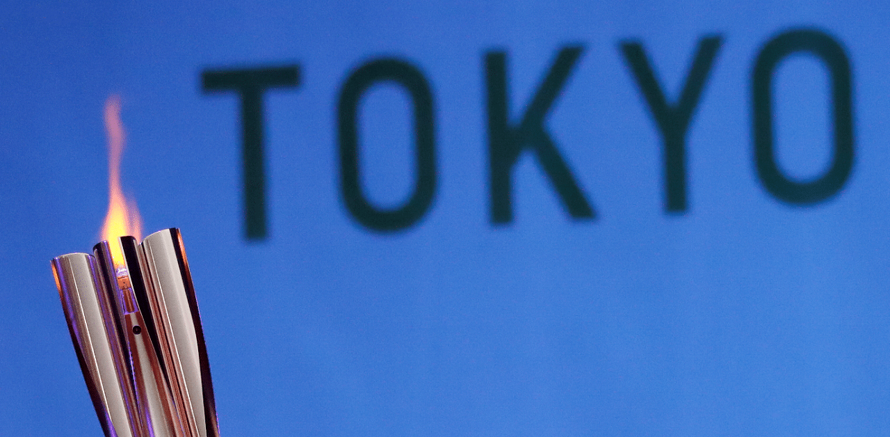 The Olympic torch is seen at Hibarigahara Festival Site, during the last leg of the first day of the Tokyo 2020 Olympic torch relay, in Minamisoma, Fukushima prefecture. Credit: Reuters Photo