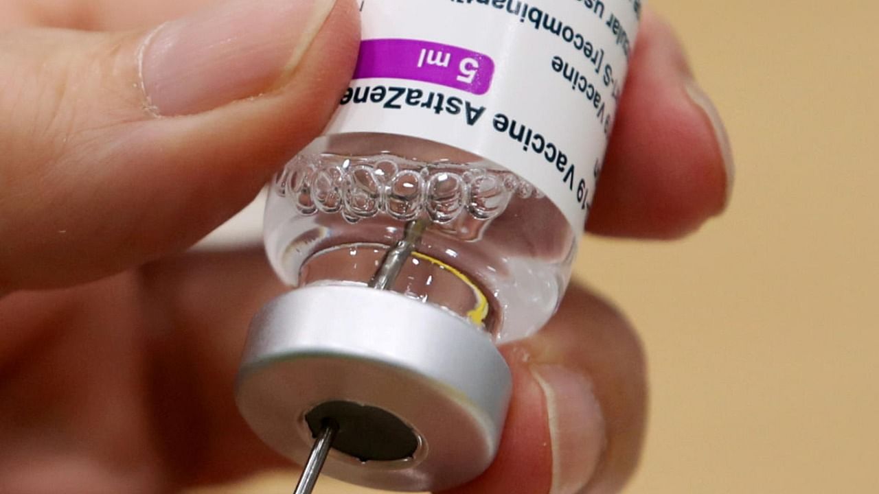 A medical worker prepares a dose of Oxford/AstraZeneca's Covid-19 vaccine at a vaccination centre in Antwerp. Credit: REUTERS/Yves Herman/File Photo