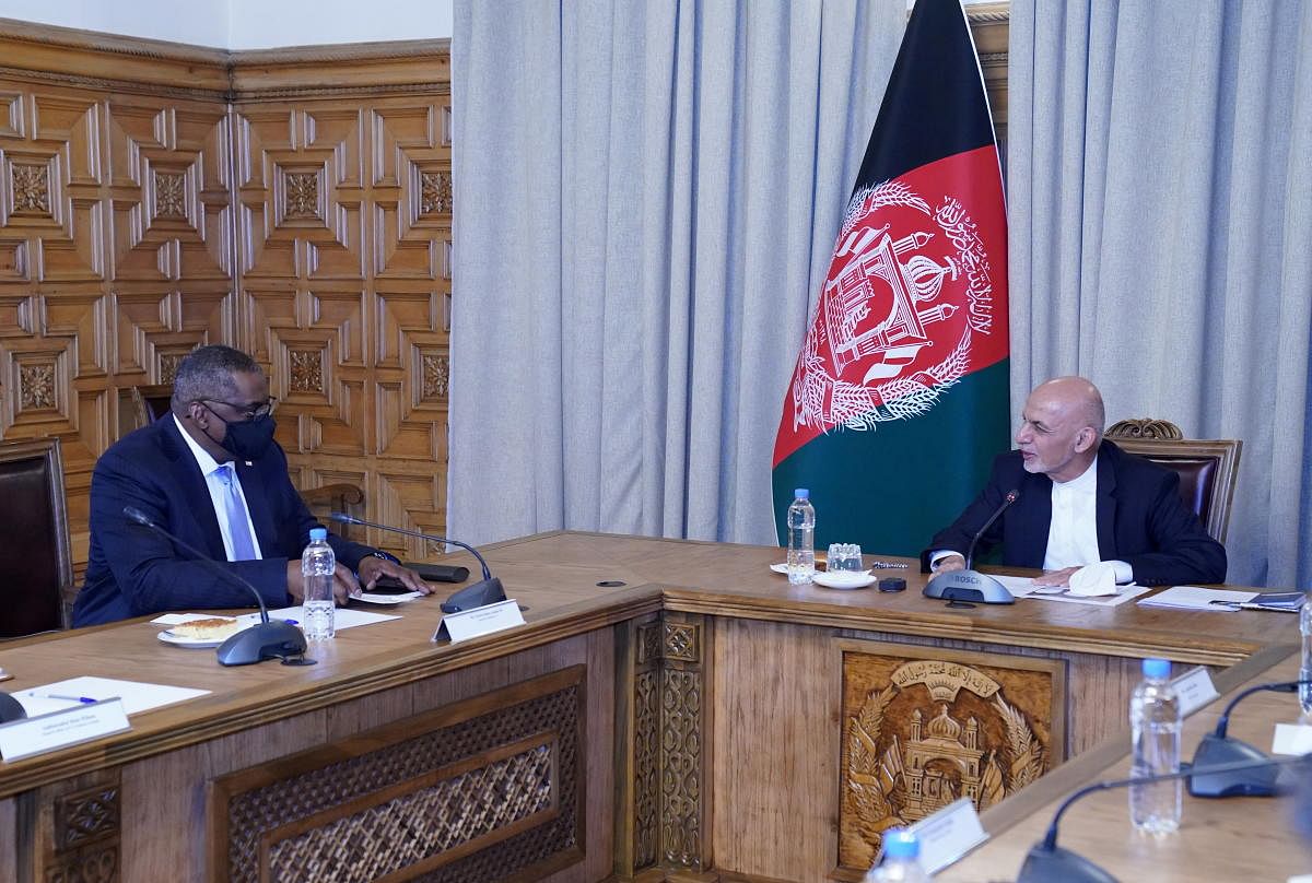 Afghanistan's President Ashraf Ghani (R) meets US Secretary of Defense Lloyd Austin, in Kabul, Afghanistan March 21, 2021. Credit: Reuters photo.
