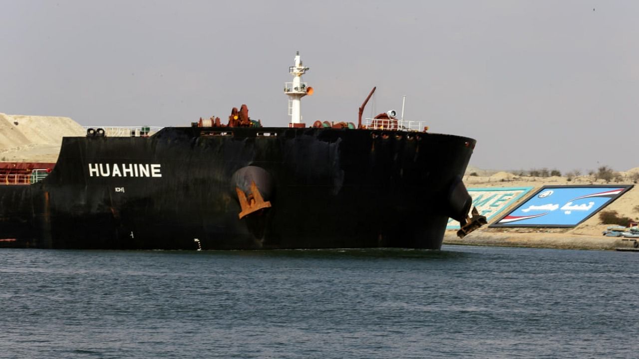 A ship is seen after sailing through Suez Canal as traffic resumes after a container ship that blocked the waterway was refloated, in Ismailia. Credit: Reuters file photo.