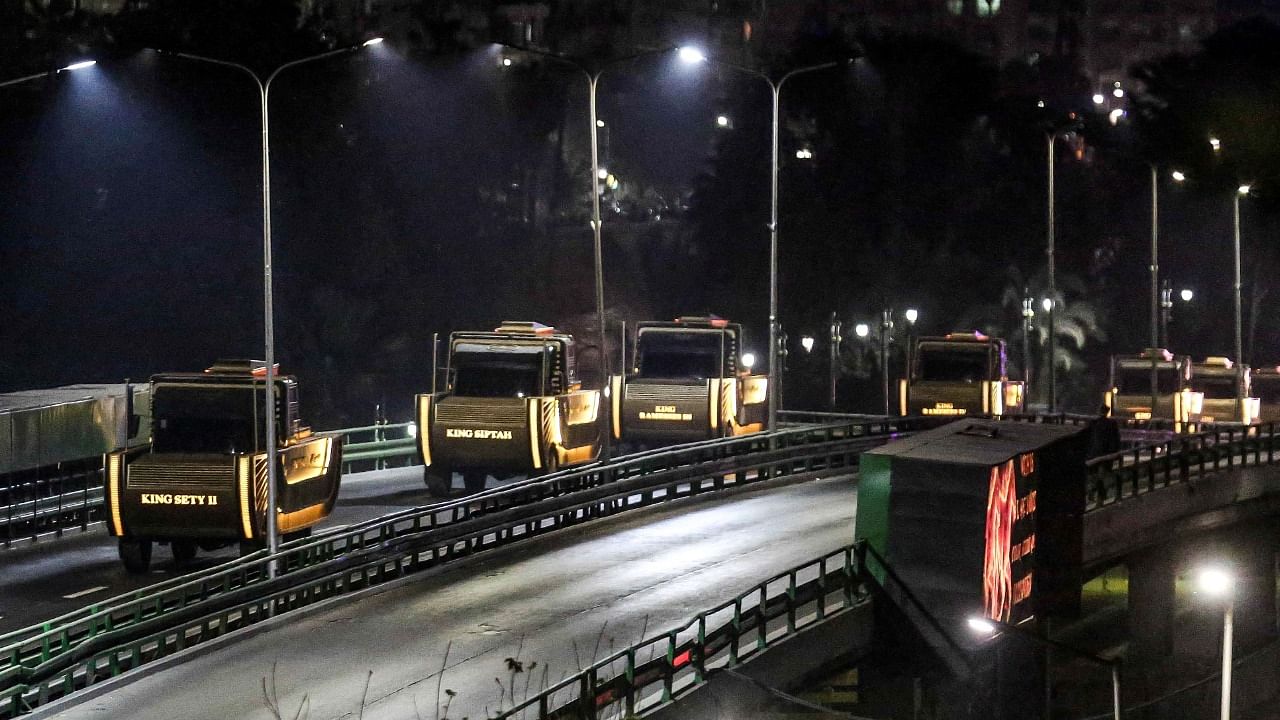 he carriages carrying the mummies of Pharaoh Seti II, Siptah, Ramses III, and Ramses IV drive along the Malek al-Saleh bridge near old Cairo on their way to their new resting place at the new National Museum of Egyptian Civilisation (NMEC) in historic the Fustat district of Egypt's capital Cairo. Credit: AFP Photo
