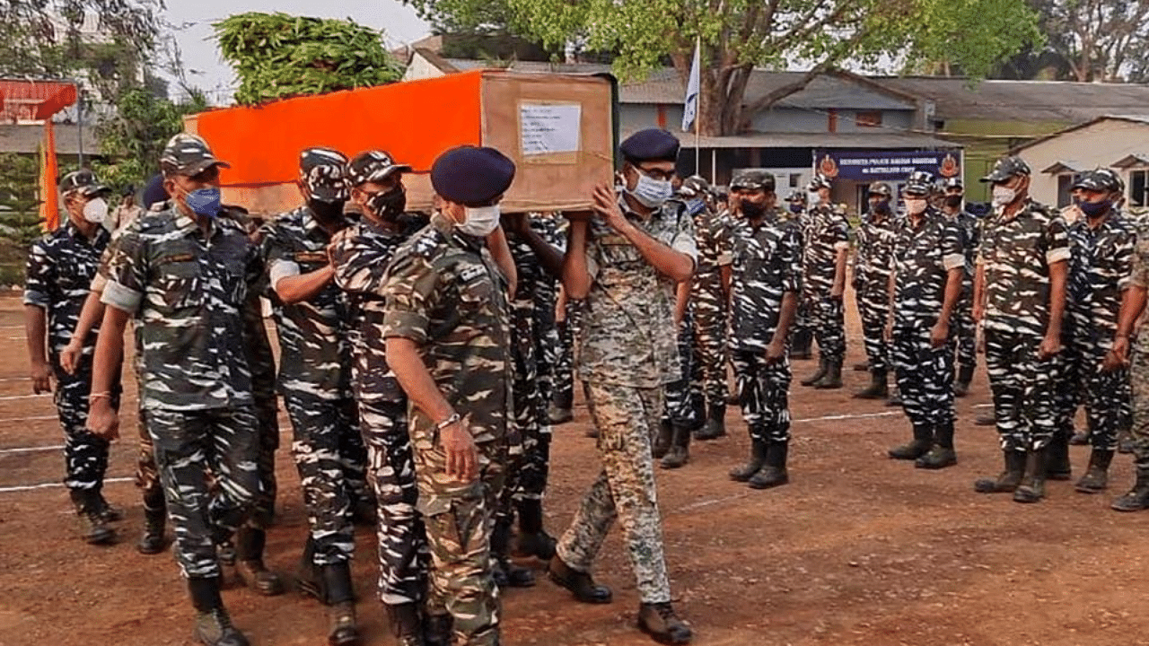 Members of Indian security forces carry the coffin of one of their colleagues who died following a gun battle with Maoist rebel at the Central Reserve Police Force's Jagdalpur camp in Bijapur district of India’s Chhattisgarh state on April 4, 2021. Credit: AFP Photo