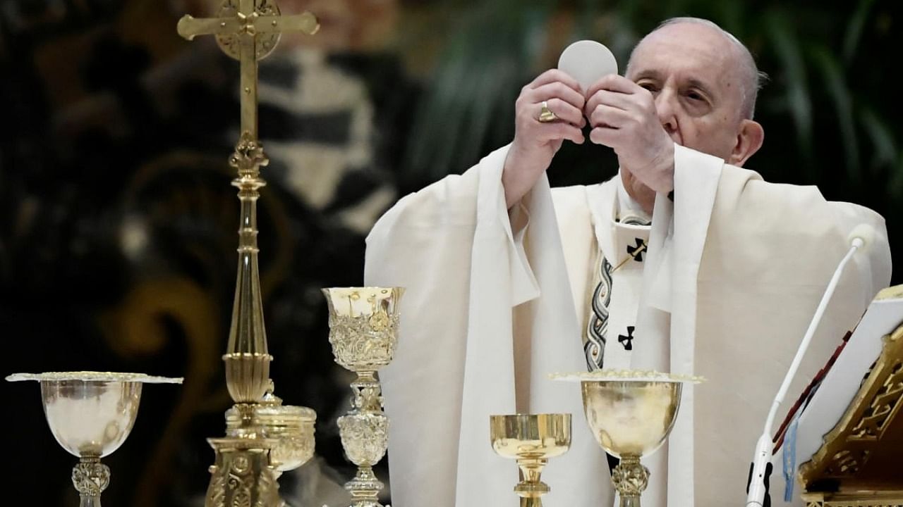 Pope Francis celebrates the Eucharist during Easter Mass at St. Peter's Basilica at the Vatican. Credit: Reuters.