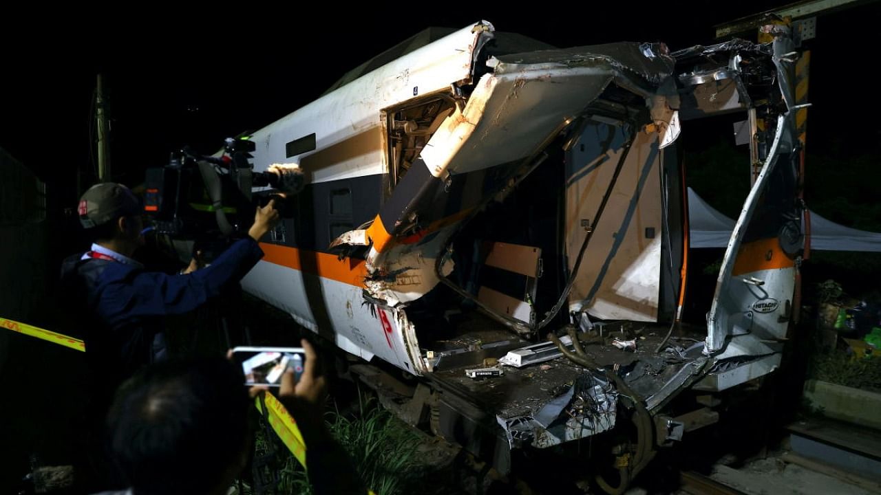 A damaged train carriage is seen at the site of the deadly train derailment at a tunnel, north of Hualien. Credit: Reuters.