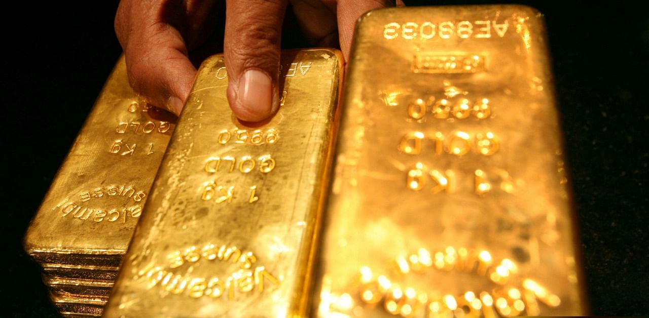 Gold is seen as a hedge against rising inflation. Credit: Reuters Photo