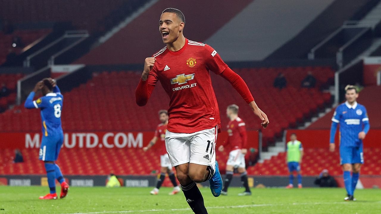 Mason Greenwood celebrates after scoring Manchester United's winner against Brighton in the English Premier League. Credit: Reuters Photo