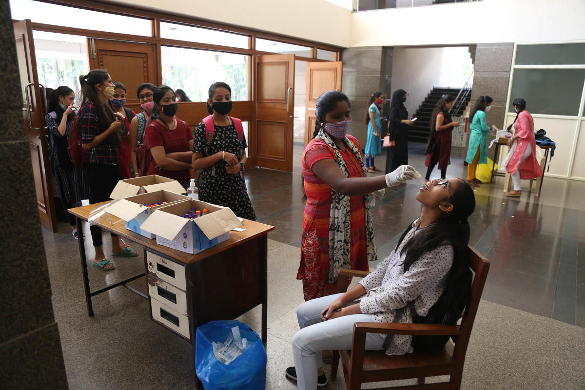 Students of NMKRV College undergoing swab tests for Coronavirus, in Bengaluru. Credit: DH File Photo