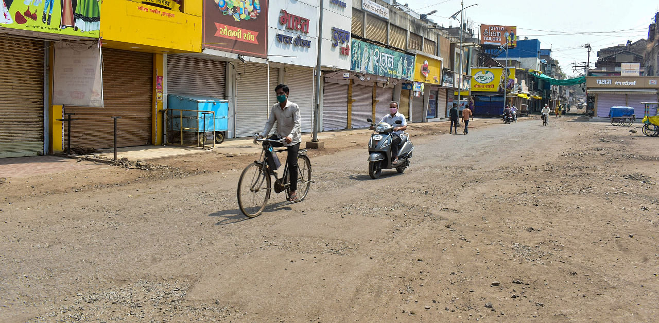 Shops are closed in the city during the complete lockdown on weekend in Solapur. Credit: PTI Photo