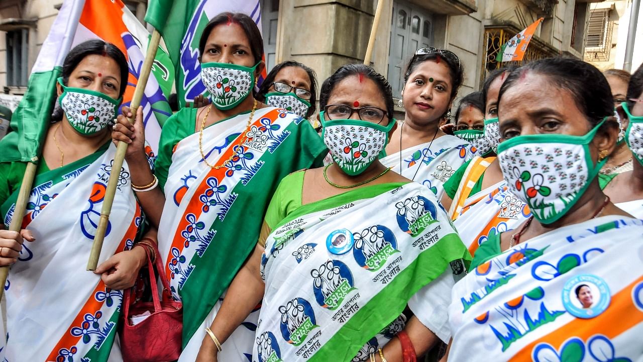 TMC supporters during an election campaign of West Bengal Sports and Youth Affairs Minister Arup Biswas ahead of the third phase of state assembly polls. Credit: PTI.